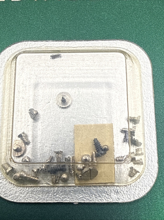 Genuine Rolex 1555-7998 Set of Screws New Sealed Package